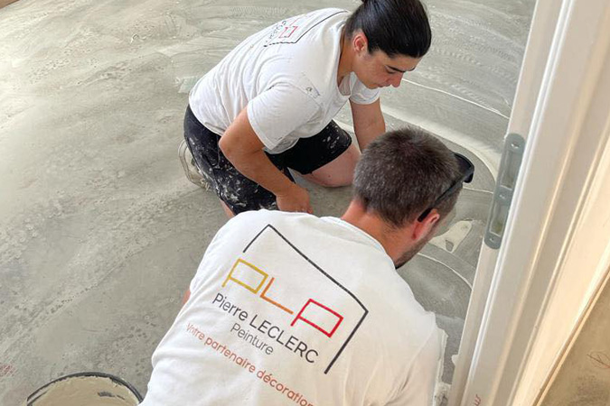 Equipe PLP en pleine pose de sol